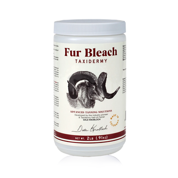 A container of Advanced Tanning Solutions Fur Bleach Taxidermy with a label featuring an illustration of a dall sheep.