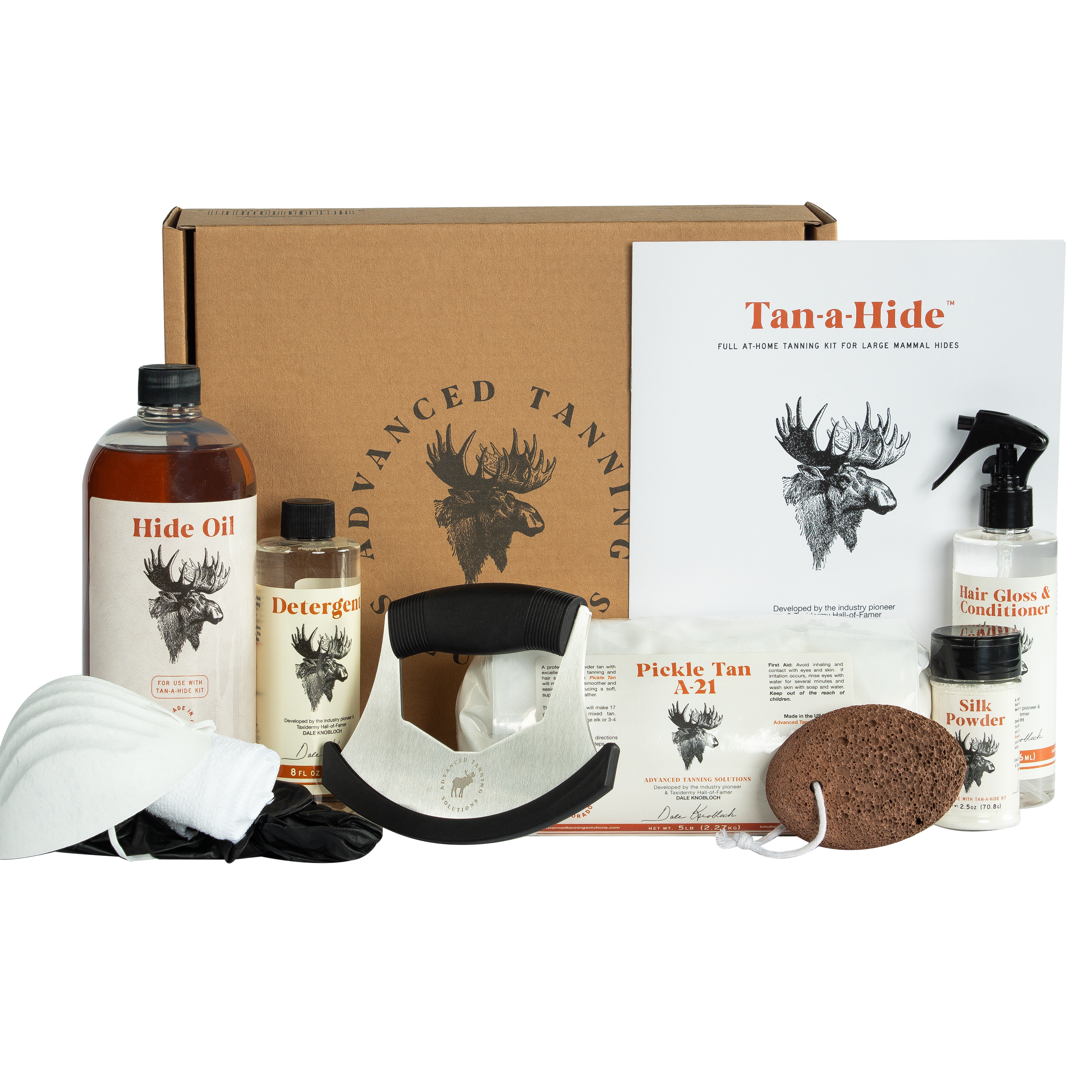 Advanced Tanning Solutions Tan-A-hide kit including Hair Gloss & Conditioner, Silk Powder, Pickle Tan A-21, Detergent, Hide Oil, and fleshing shaving tool for taxidermy. 